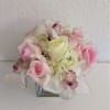 A beautiful combination of rare orchids, roses, and hydrangeas for all kinds