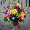 A vase of mixed seasonal flowers