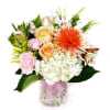 A pretty design with hydrangea, rose, mum, astroemeria and accents.