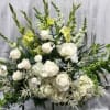 Symbolizing peace, serenity and purity, white flowers can help comfort those grieving