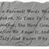 Cast stone with metal stand for display. Reads &quot; No farewell words