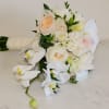 beautiful hand wrapped bouquet with garden roses and orchids.