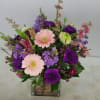 Pink, Lavender and Purple All around arrangement with Gerbera Daisy, Larkspur, Stick