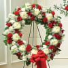 Red and White Wreath on easel
