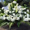 LARGE FLOOR BASKET
WHITE LILLIES, WHITE STALK, WHITE CARNATIONS, AND WHITE MINI CARNATIONS