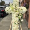 All white cross, includes roses, carnations, chrysanthemums &amp; lilies. 