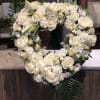 Filled with Roses, Daises, Carnations and more, all white flowers, this open