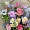 Adorable basket overflowing with beautiful Spring blooms 