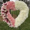 Twenty inch heart filled with carnations and lilies