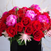 Our newest black acrylic box with premium red roses and peonies. Created