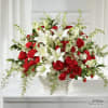 Crafted with bold red and soft white blooms to beautifully display your