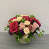 Mixture of beautiful roses and our best choice in greenery.