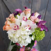This enchantingly beautiful arrangement is designed with a 6in. Cylinder clear glass