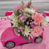 This floral is made inside a Barbie Car 