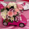 This floral is made inside a Barbie Car 
