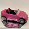 This floral is made inside a Barbie Car 
