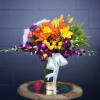 All premium fresh flowers including orchids, roses, lilies... and accents in a