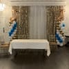 Balloon columns ranging in different heights.  Can be topped off with
