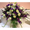 This is a gorgeous purple an white casket spray (casket top) made