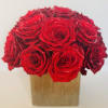 This beautiful classic arrangement includes two dozen Ecuadorian Red Roses and comes