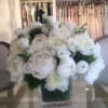 Sq glass vase featuring White Peonies, white lisianthus, green dianthus.