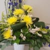 Send a beautiful funeral arrangement to honor a legacy, with the colors
