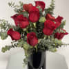 Red Roses and Baby eucalyptus all around centerpiece 