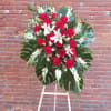 Composed of Roses, Lilies, Snapdragons, Monster Leaves, Fillers. Stand included.