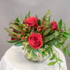 Send your love with this perfect little arrangement of red roses and