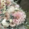 A unique arrangement inspired by a waterfall. Flowers falling down of an