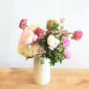 Peony garden arrangement is profusion of spring brilliance. two-tone roses (lavender w/