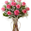 A marvellous medley of color and fragrance, these pink roses, nestled among