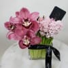 Crystal base with luxurious hyacinth, accompanied by pink cymbidium.