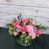 Mixed Seasonal flowers in soft colors. Lilies, alstro, roses and daisys. 