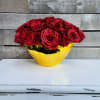 Glittered red roses with a gold oval container 