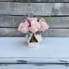 Pink roses with eucalyptus and pink waxflowers
