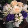 Mix of sahara roses, purple and white hyacinth, lisianthus, premium fillers, arranged