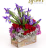 This lovely combination of red roses, dusty miller, purple iris, purple/pink hydrangea