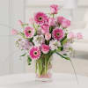 Sweet pink roses, Gerbera daisies and tulips are sure to delight the