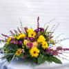 This bouquet reminds me of the sunset with the pinks, yellows, and