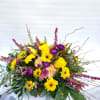 This bouquet reminds me of the sunset with the pinks, yellows, and