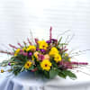 This bouquet reminds me of the sunset with the pinks, yellows, and