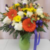 Bright and cheery arrangement with white roses, yellow daisies, Gerbera daisies, and