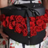 Take her breath away with his sexy black hatbox overflowing with deep