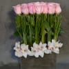 Lovely Pink Roses arranged with Cymbidium Orchids 