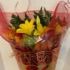 Bouquet of florals wrapped with flowing mesh and Asian red&amp;gold emblem. (Medium