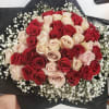Hand tied bouquet with rose 
Red and quicksand, baby breath touch!