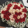 Hand tied bouquet with rose 
Red and quicksand, baby breath touch!