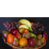 Succulent fruit basket assorment of fresh grapes, pears, mangoes, nectarines, bananas, apples