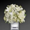 this exquisite all-white bouquet in a dazzling mirrored silver cube may be